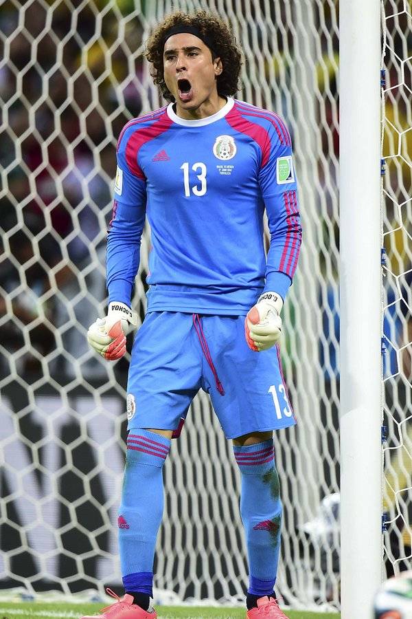奥乔亚的成名之战应该是2014年巴西世界杯，小组...