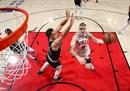 NBA常规赛公牛128-104马刺武切维奇22分12篮板拉文20分。