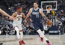 NBA掘金轻松击败独行侠约基奇，拿下三双带领球队取得胜利。