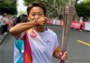 王寿彭作为杭州亚运会火炬手，将重返中国女足参加亚运会。
